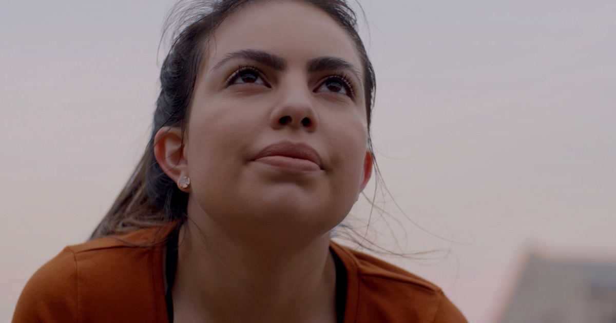 In a screengrab from the "Because Today Is Tomorrow’s Time to Beat" promo video, a young female athlete gazes into the middle distance.