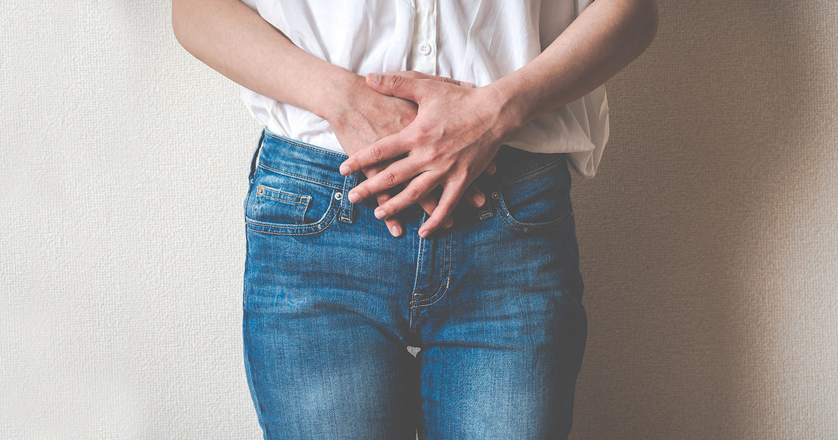 Person holding stomach