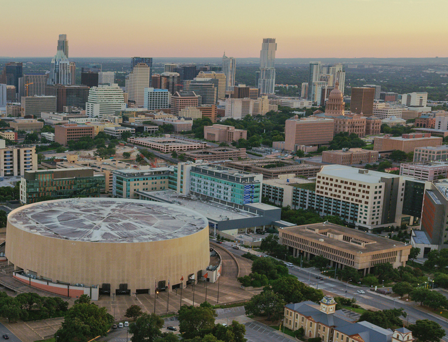 An overhead view of downtown Austin with the site of the new University of Texas Medical Center in the foreground.