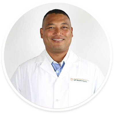 Orthopedic surgeon Anthony "AJ" Johnson MD, FAOA, FACS, FAAOS, wearing a white coat and smiling in front of a white backdrop.