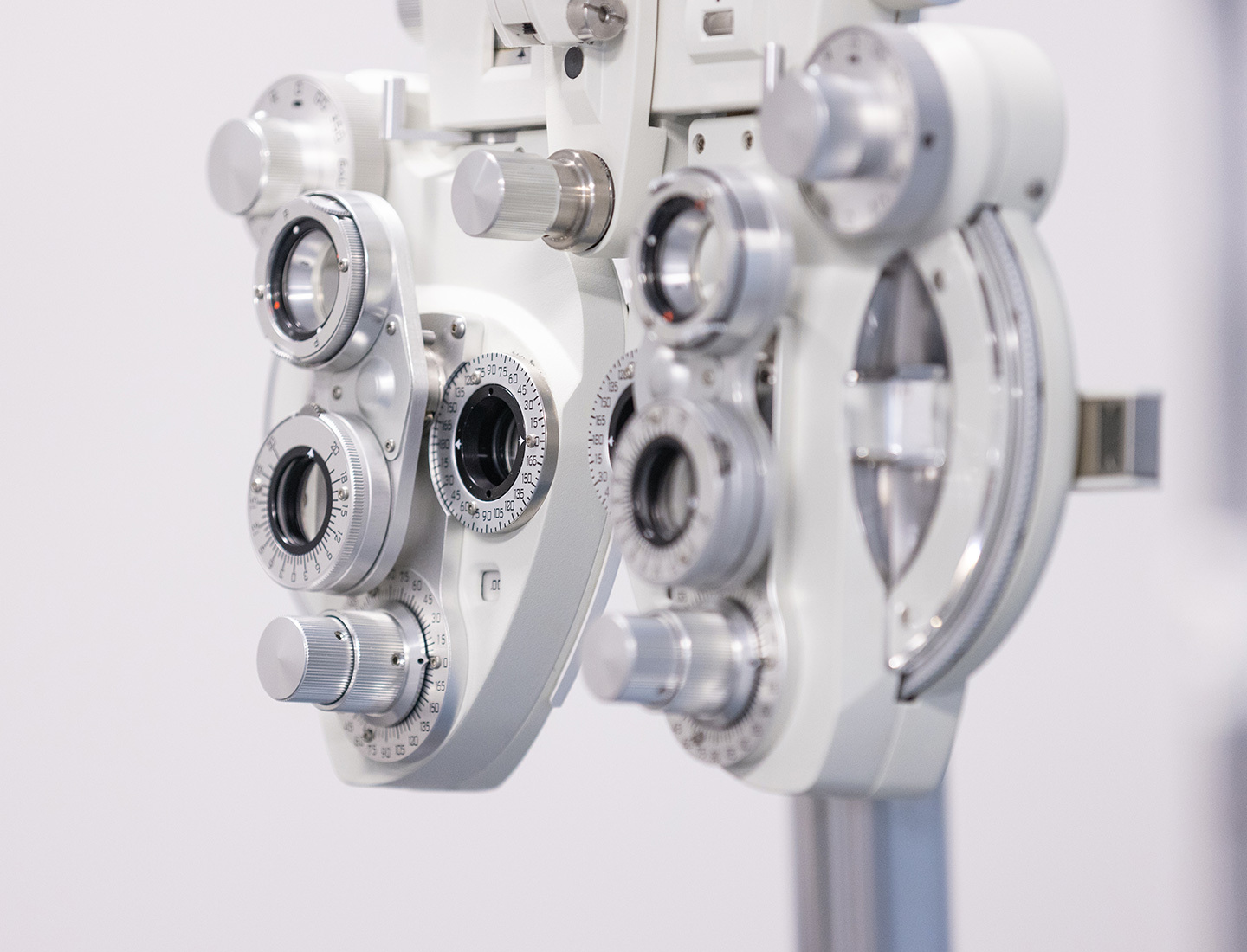 A silver phoropter used in eye exams.