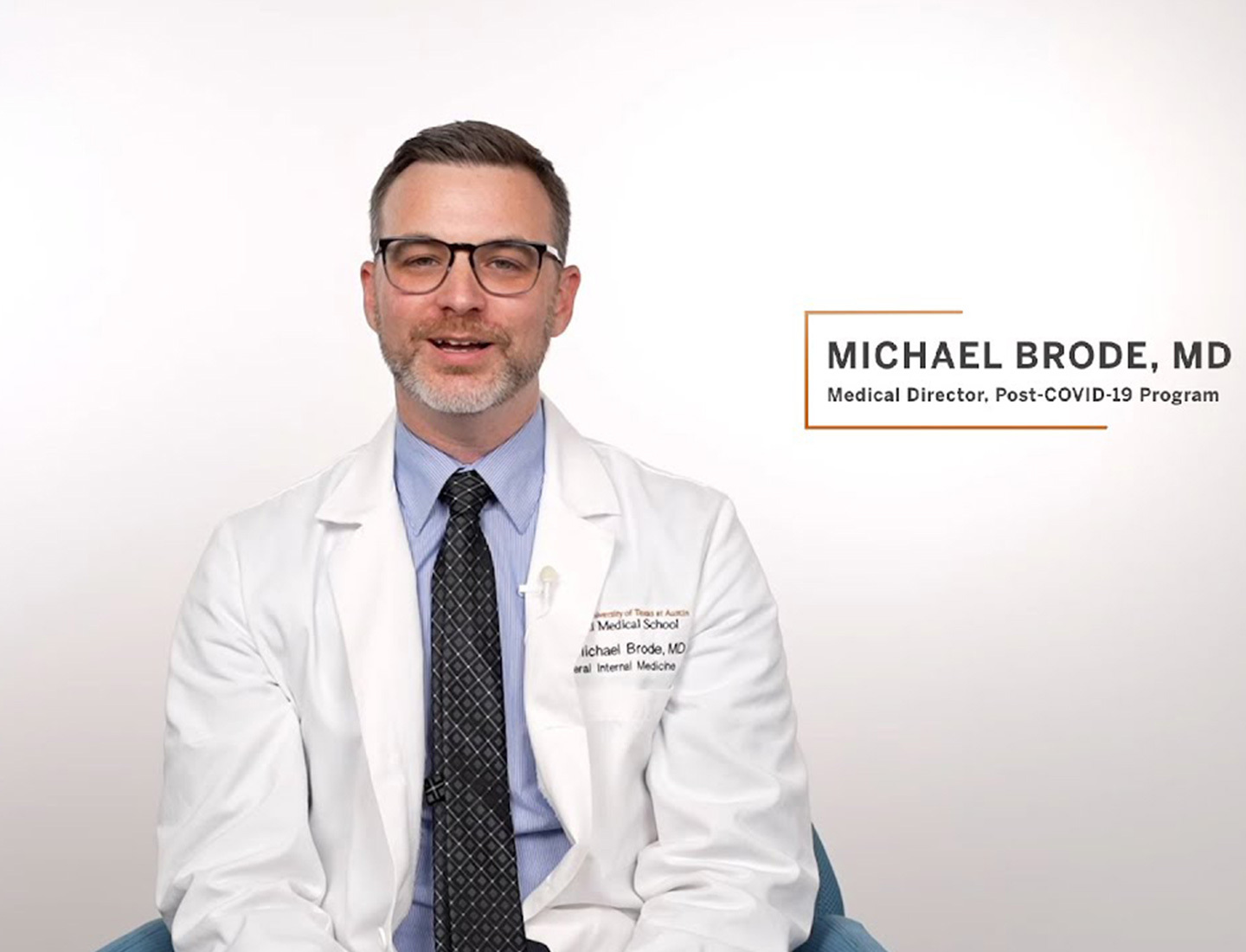 Medical Director of the Post-COVID-19 Progam, Michael Brode, MD, posing in front of a white backdrop.