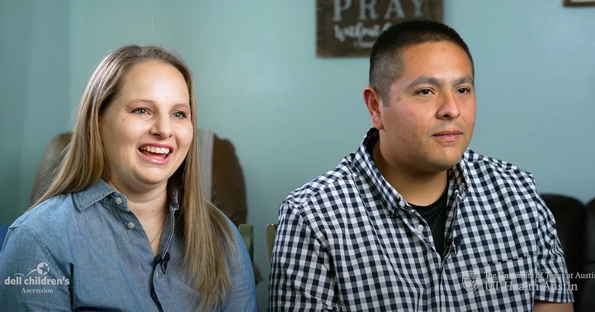Rachel and Andrew Contrearas sit in their home, mid-conversation.