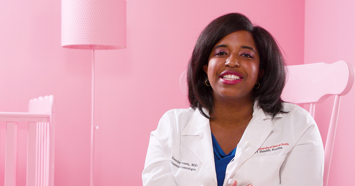 Denise Johnson, MD, an ob-gyn for Women's Health, is seated in a rocking chair with in pink baby's room answering questions about the 1st trimester of pregnancy.