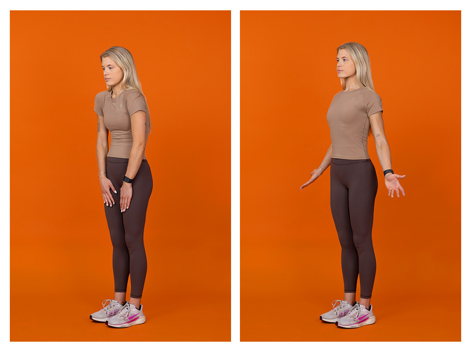A woman with long blonde hair worn down is seen standing in two different photos against an orange background. She is wearing tan/brown exercise clothes. In the first photo, her hands are down to her sides with her palms resting on the front of her legs with her shoulders hunched forward. In the second image, her palms are stretched out and upwards about waist level, and her shoulders are rolled back a bit.