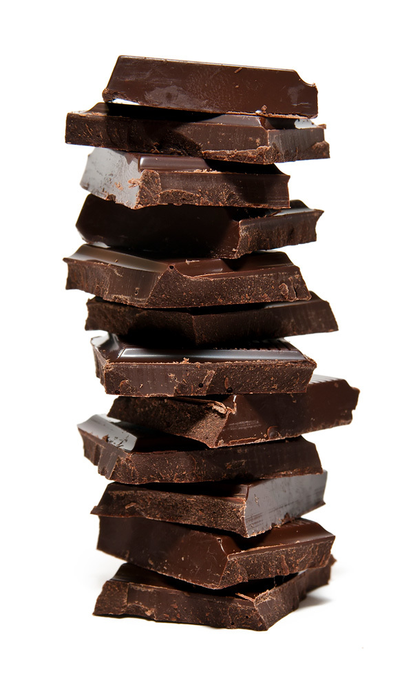 Closeup of a stack of chocolate pieces.