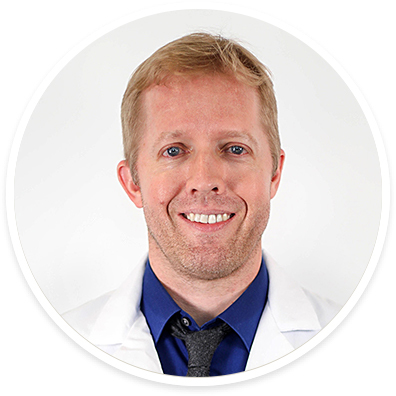 A headshot portrait of John A. Bertelson, MD, FAAN Neurologist, Comprehensive Memory Center, Mulva Clinic for the Neurosciences.