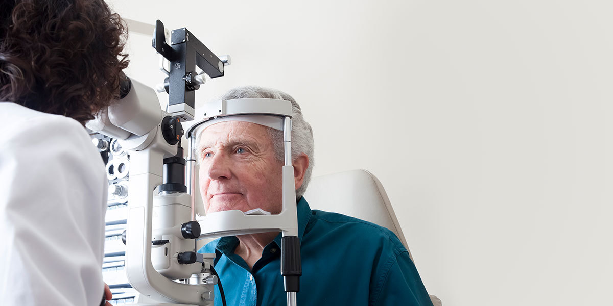 Older man undergoing an eye exam