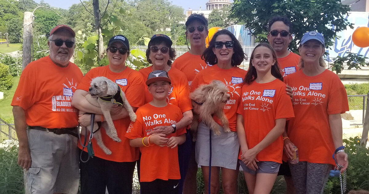 Dorothy De La Garza surrounded by loved ones at the 2022 Walk to End Bladder Cancer.