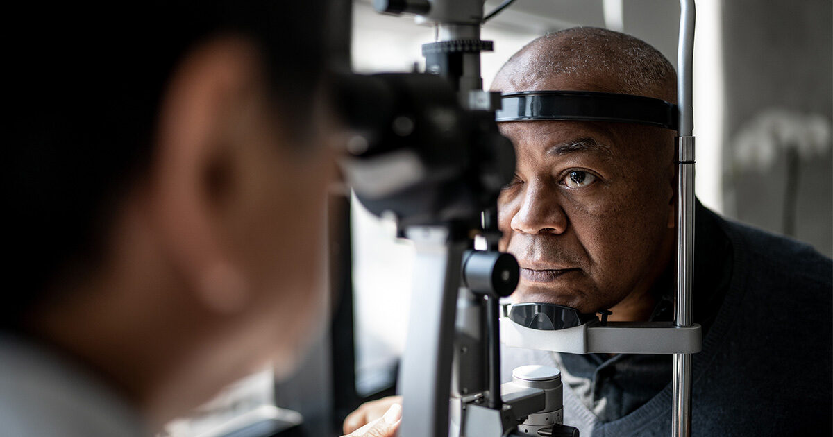 A man receives an eye exam.