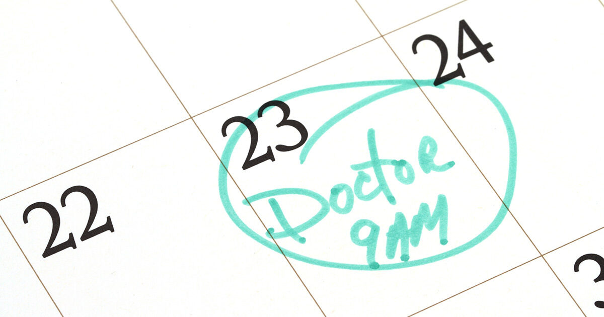 Dates on a calendar with "Doctor 9 AM" written and circled in green on the 23rd