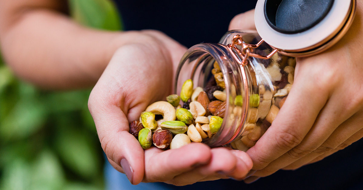 Eating a healthy snack of trail mix