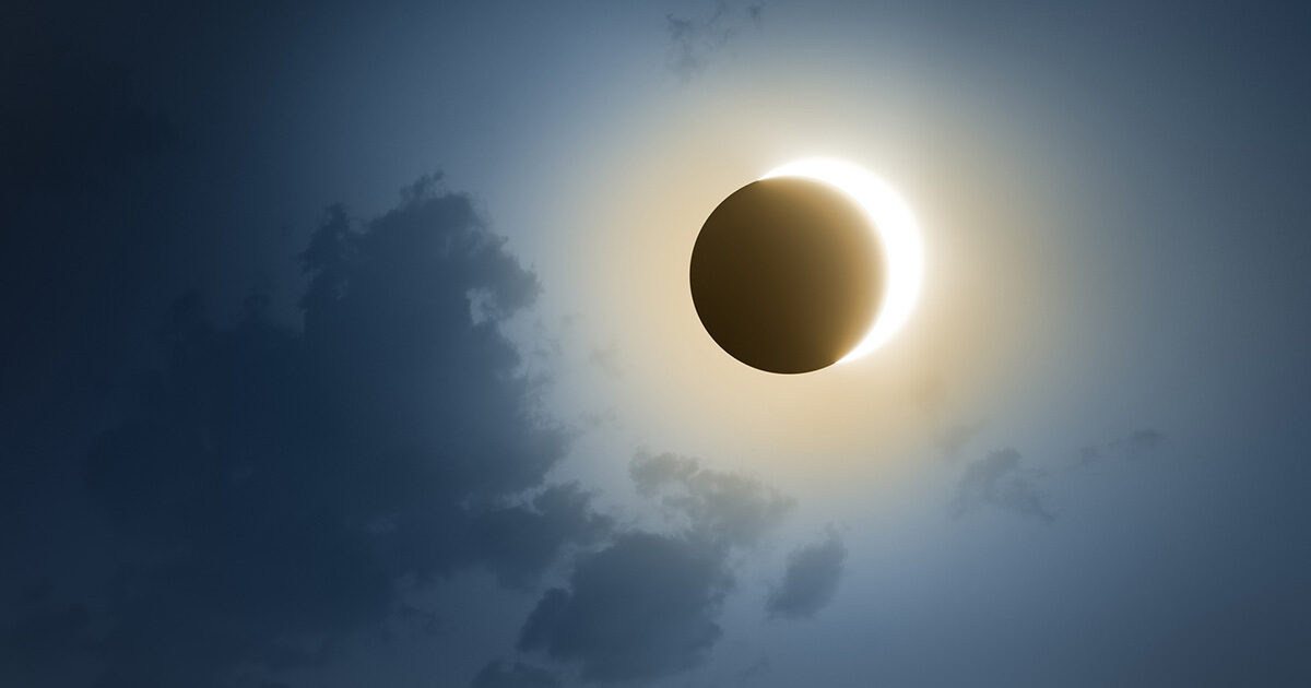 The moon partially eclipsing the sun.