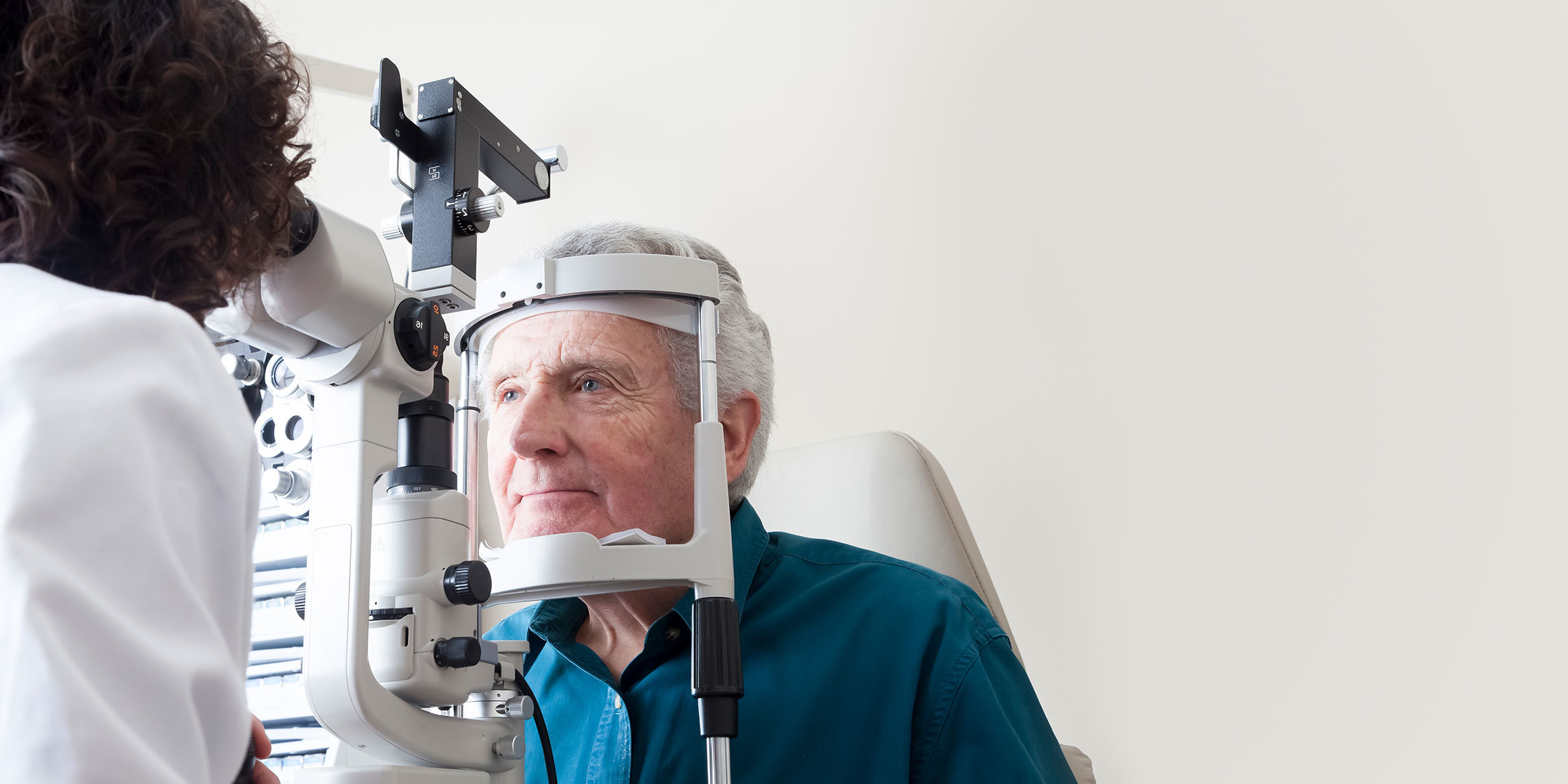 Older man undergoing an eye exam