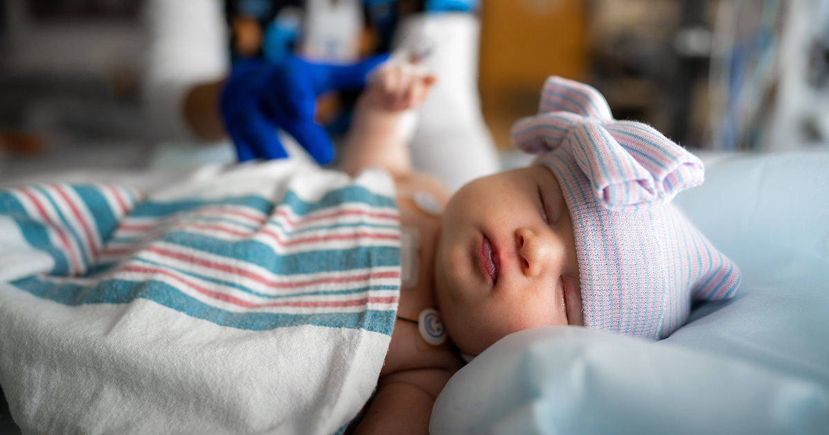 Baby resting after heart surgery