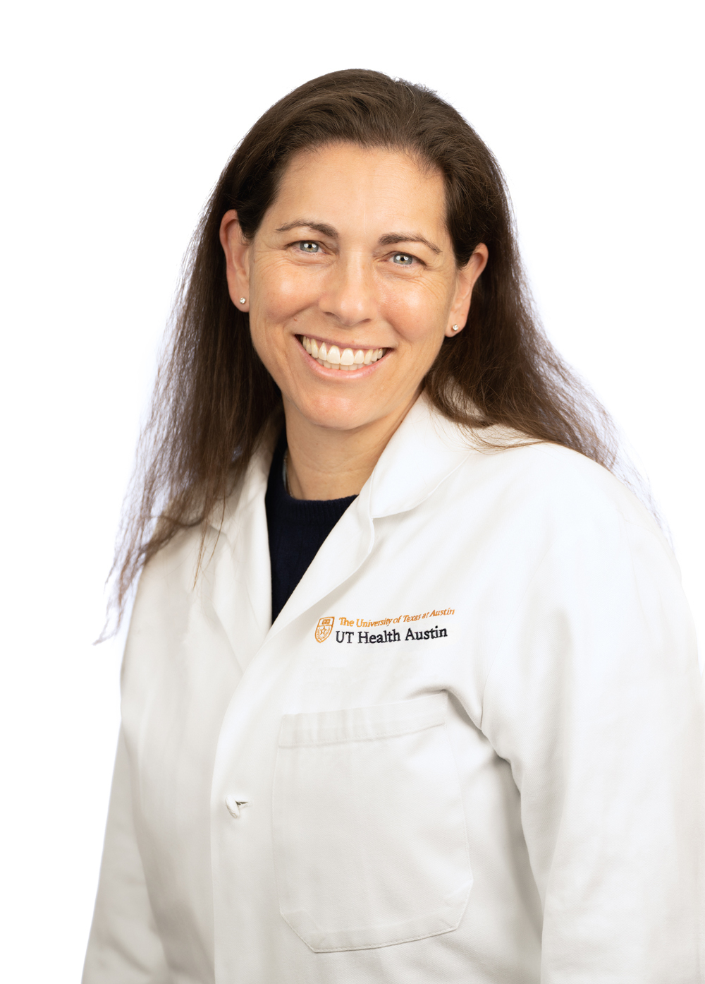 Pediatric anesthesiologist Erin Gottlieb, MD, wearing a white coat and smiling in front of a white backdrop.